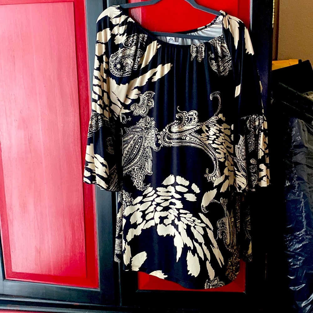 Light silky feeling dress that doesn’t wrinkle.